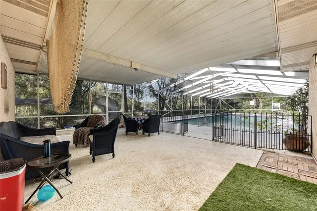 a view of a patio with a table chairs and a patio