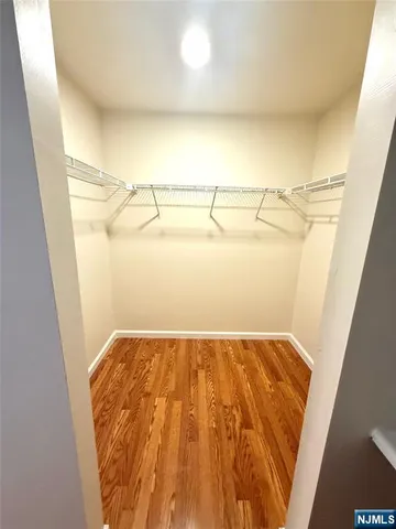 a view of a hardwood & utility room