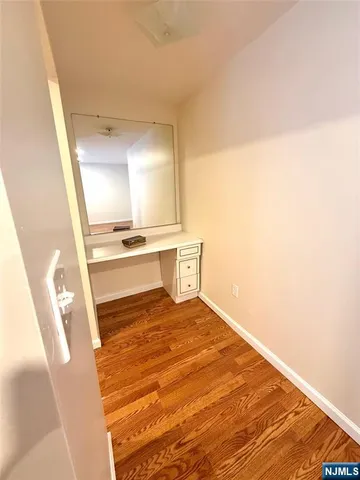 a bathroom with a toilet and a tub
