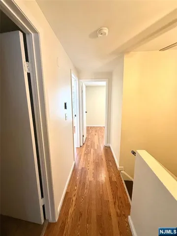 a view of a bathroom with a shower and a toilet