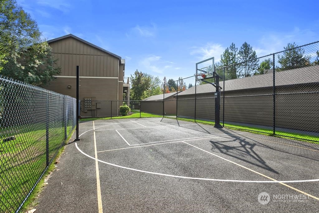 18930 Bothell Everett Highway, Unit J105 Bothell, WA 98012 - Photo 21 of 21 a view of a tennis court
