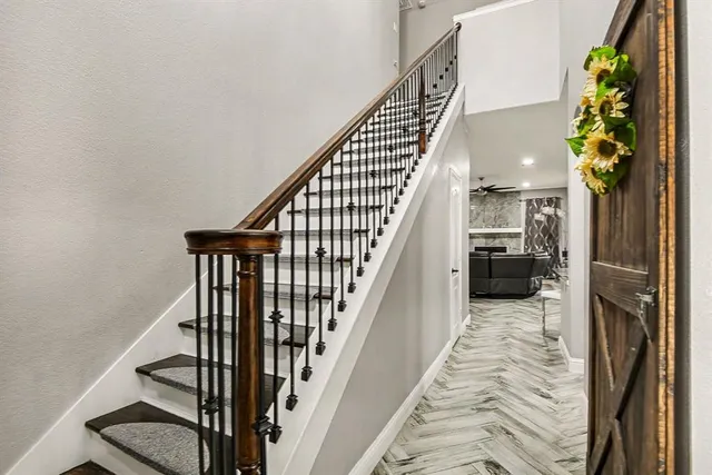 a bedroom with a bed and a desk