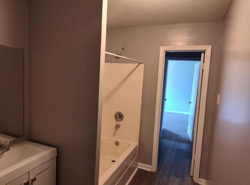 2525 Rozelle Street Memphis, TN 38114 - Photo 4 of 8 a bathroom with a bathtub and a sink