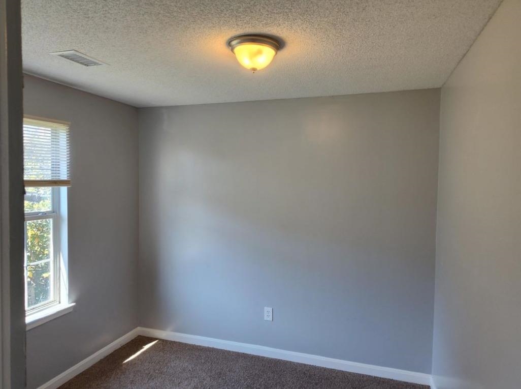 2525 Rozelle Street Memphis, TN 38114 - Photo 5 of 8 an empty room with a window