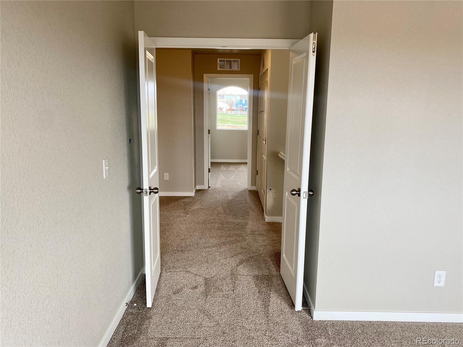 541 Ryan Avenue Fort Lupton, CO 80621 - Photo 20 of 29 a view of a room with a wardrobe space