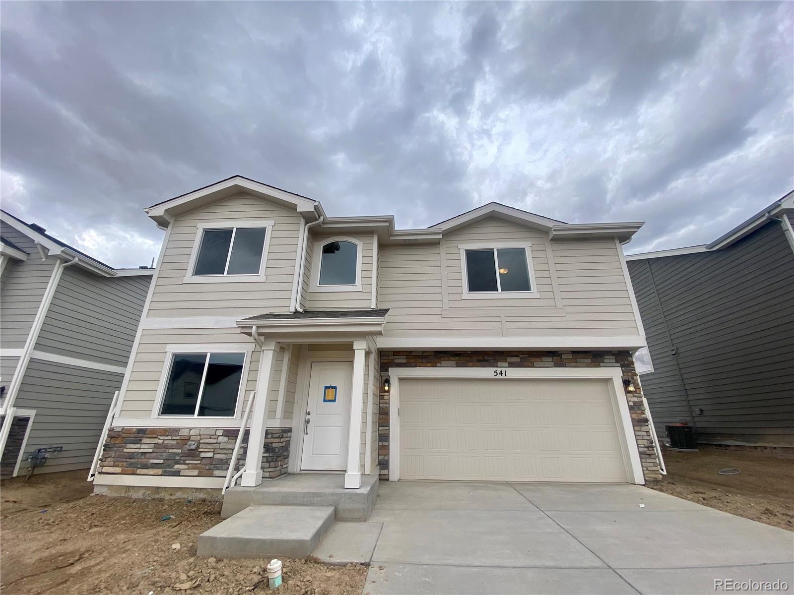 541 Ryan Avenue Fort Lupton, CO 80621 - Photo 2 of 29 a front view of a house
