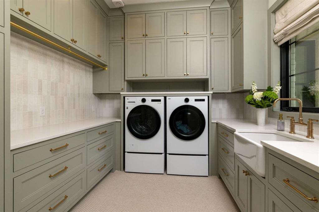1412 Chelsea Rae Lane Keller, TX 76262 - Photo 26 of 40 The downstairs laundry room is beautiful and conveniently located just off the large mud room.