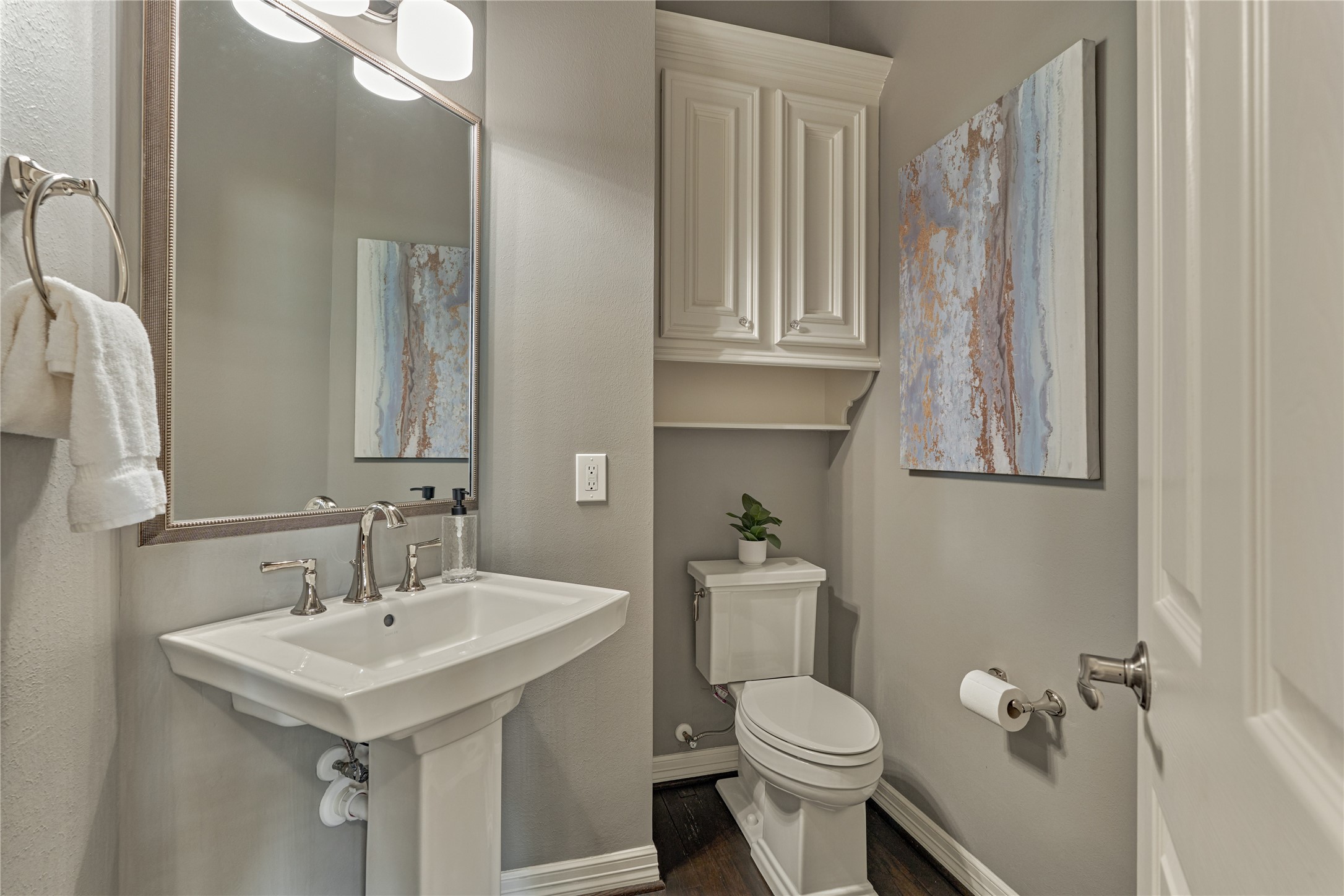 7 Gentry Oak Court Spring, TX 77381 - Photo 10 of 50 a bathroom with a sink a toilet and shower curtain