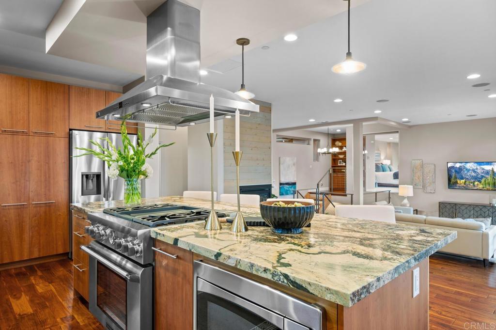 614 Ocean View Avenue Encinitas, CA 92024 - Photo 13 of 40 a kitchen with a stove and a view of living room