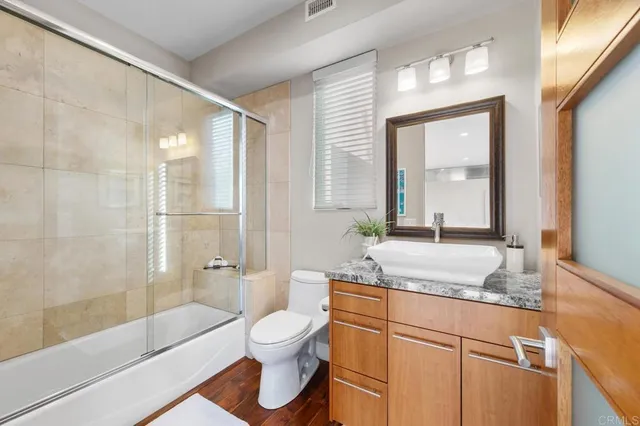 a utility room with sink dryer and washer