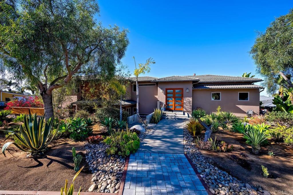 614 Ocean View Avenue Encinitas, CA 92024 - Photo 39 of 40 a front view of a house with a yard