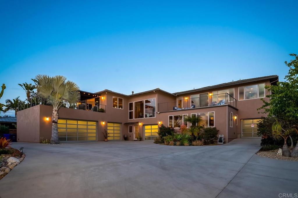 614 Ocean View Avenue Encinitas, CA 92024 - Photo 40 of 40 a front view of a house with a yard and garage
