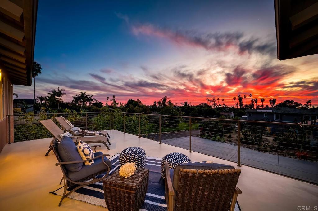 614 Ocean View Avenue Encinitas, CA 92024 - Photo 7 of 40 a view of a balcony with two chairs and a couch