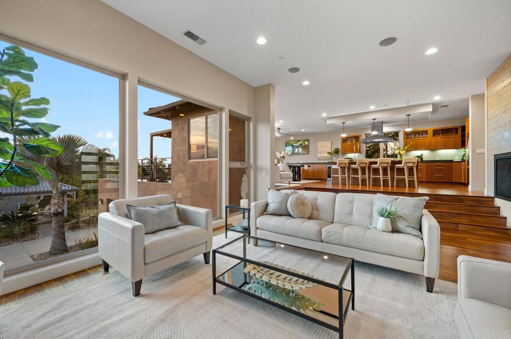 614 Ocean View Avenue Encinitas, CA 92024 - Photo 9 of 40 a living room with furniture and a large window