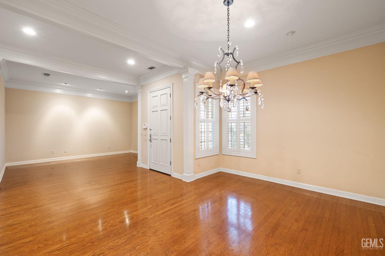 Undisclosed Address Bakersfield, CA 93311 - Photo 12 of 74 a view of livingroom with hardwood floor and window
