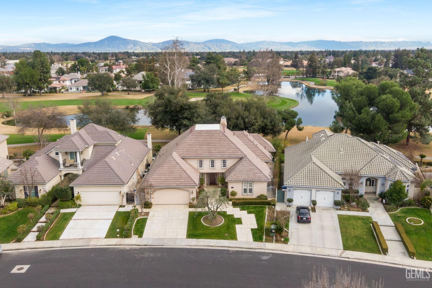 Undisclosed Address Bakersfield, CA 93311 - Photo 2 of 74 an aerial view of residential houses with outdoor space and river