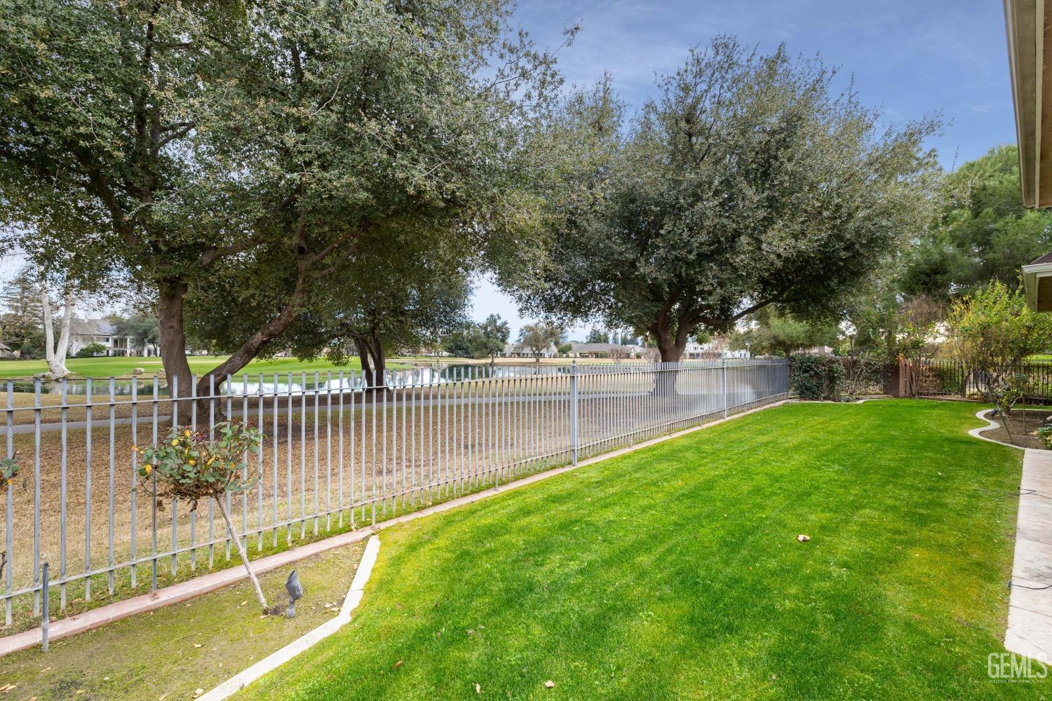 Undisclosed Address Bakersfield, CA 93311 - Photo 64 of 74 a view of yard with green space and trees in the background