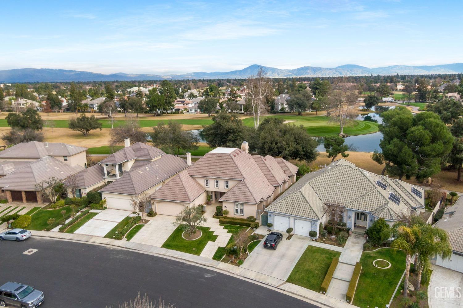 Undisclosed Address Bakersfield, CA 93311 - Photo 71 of 74 an aerial view of residential house with outdoor space and lake view