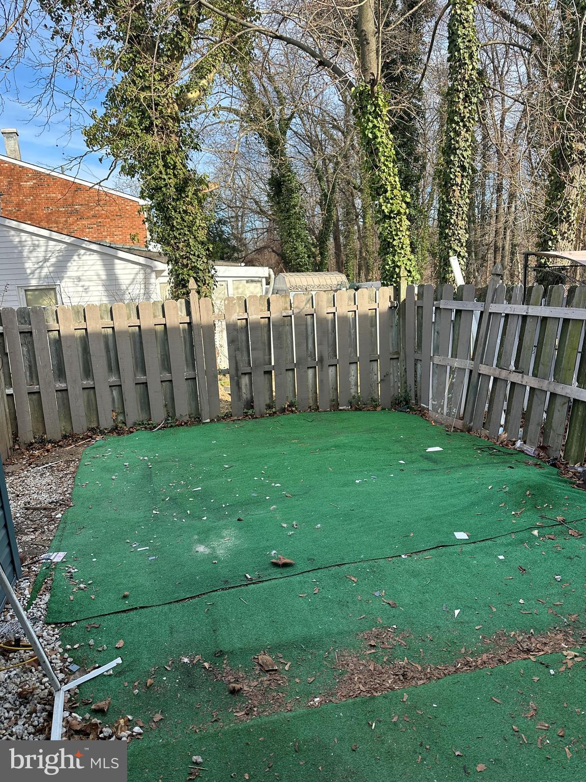 2 Ruscombe Court Willingboro, NJ 08046 - Photo 11 of 18 a view of a yard with wooden fence