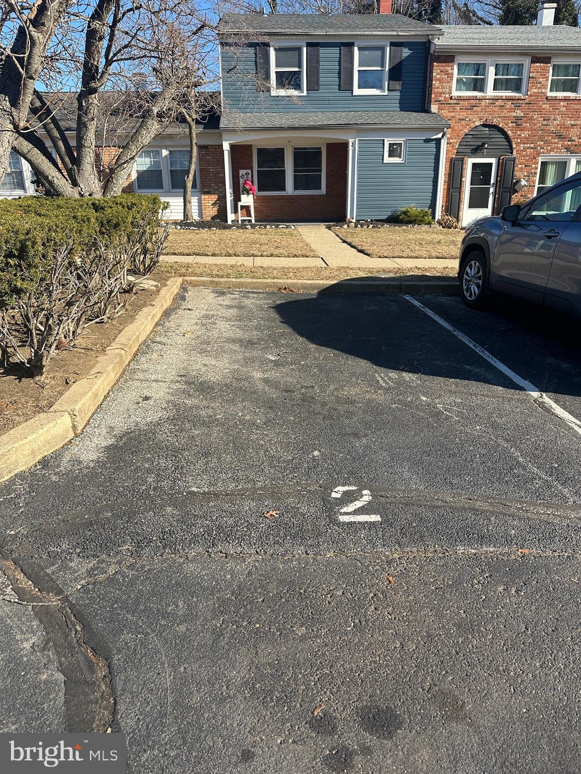 2 Ruscombe Court Willingboro, NJ 08046 - Photo 18 of 18 a front view of a building with parking space