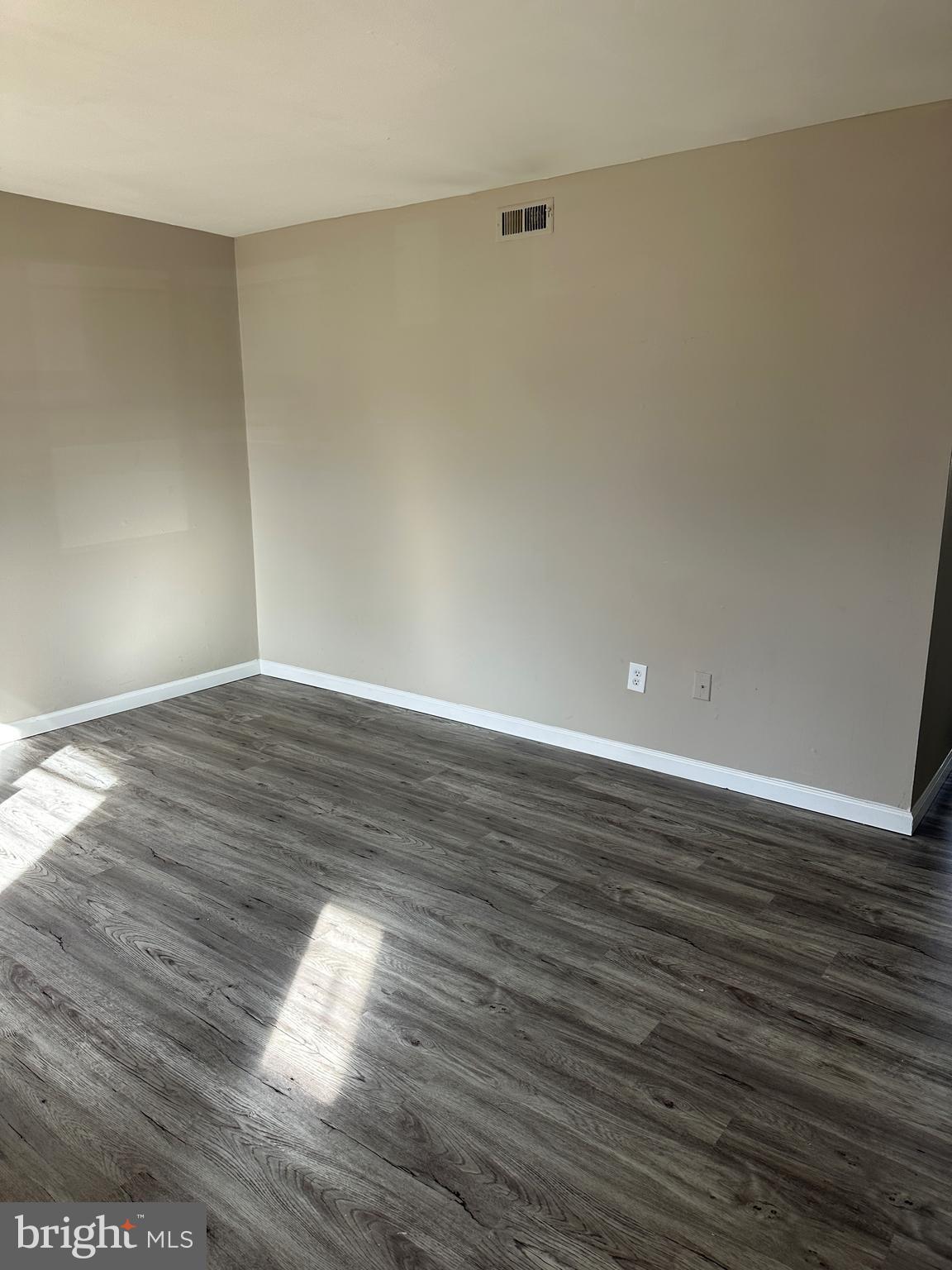 2 Ruscombe Court Willingboro, NJ 08046 - Photo 4 of 18 an empty room with wooden floor and windows