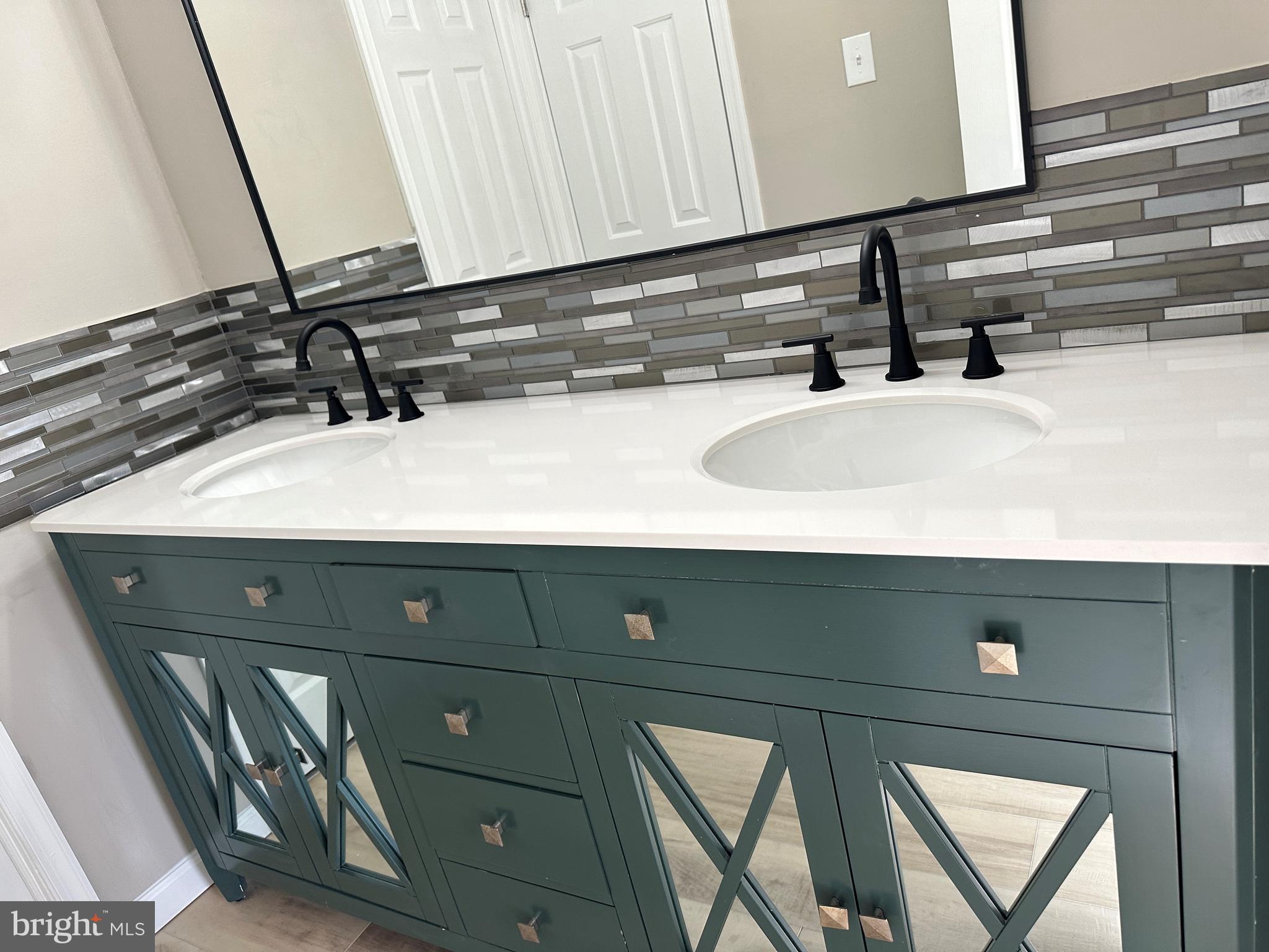 2 Ruscombe Court Willingboro, NJ 08046 - Photo 6 of 18 a bathroom with a sink and a mirror