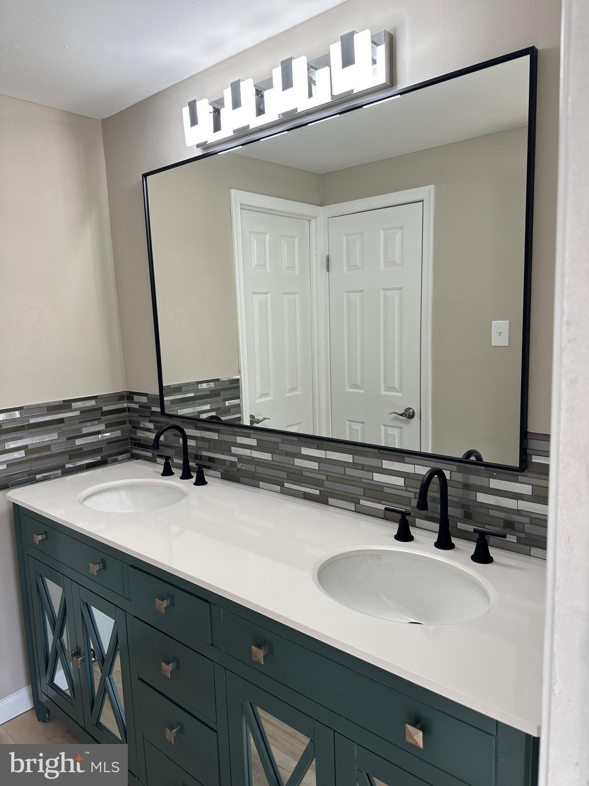 2 Ruscombe Court Willingboro, NJ 08046 - Photo 8 of 18 a bathroom with a sink and a mirror