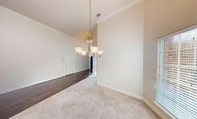 a view of a chandelier in big room