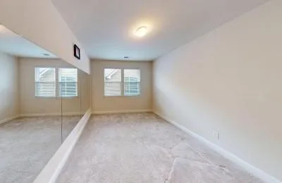 an empty room with windows