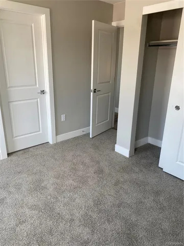 an empty room with closet