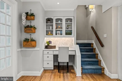 a dining room with furniture window wooden floor
