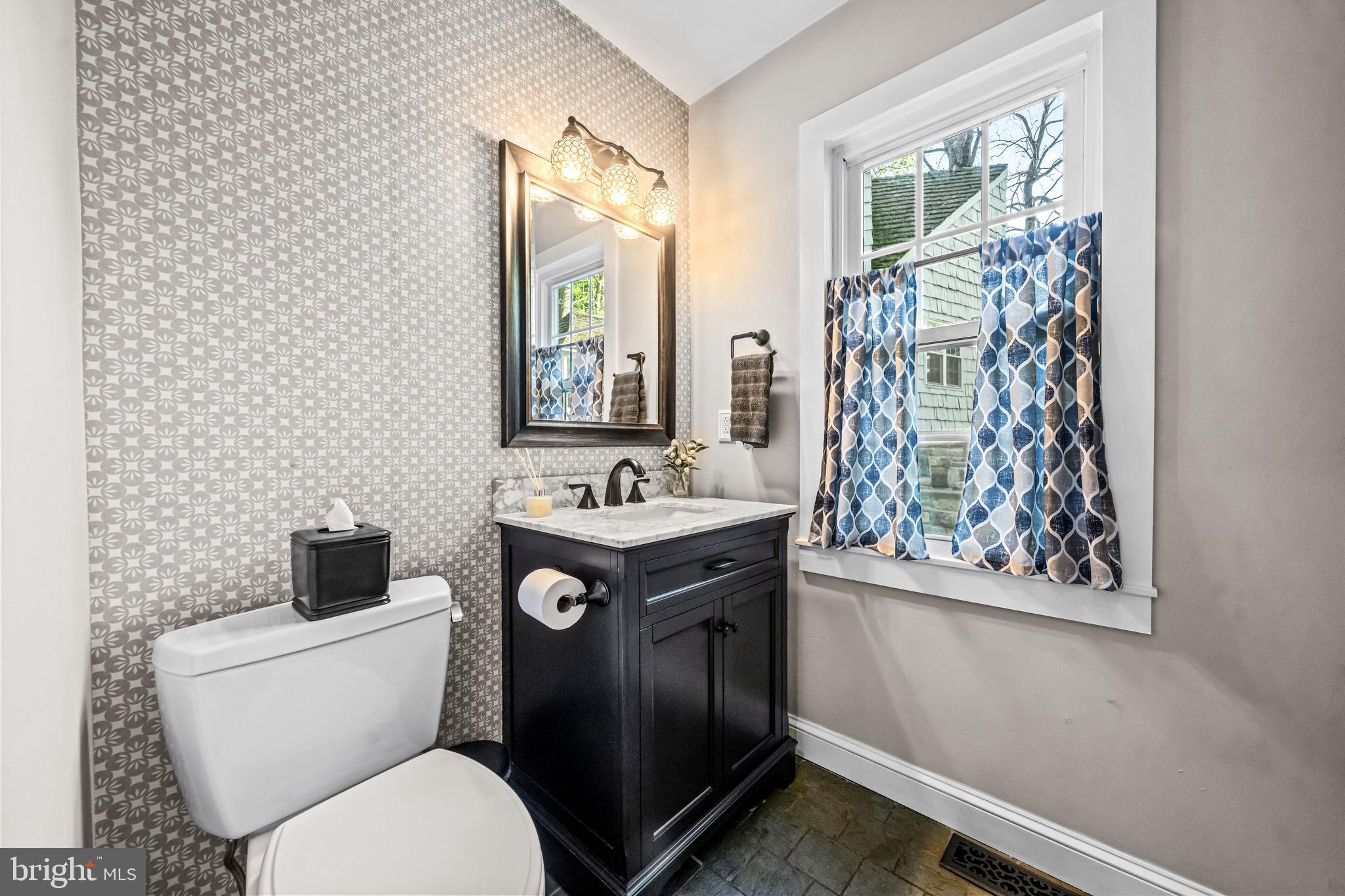 2959 Burnt House Hill Road Doylestown, PA 18902 - Photo 19 of 63 a bathroom with a toilet sink and mirror