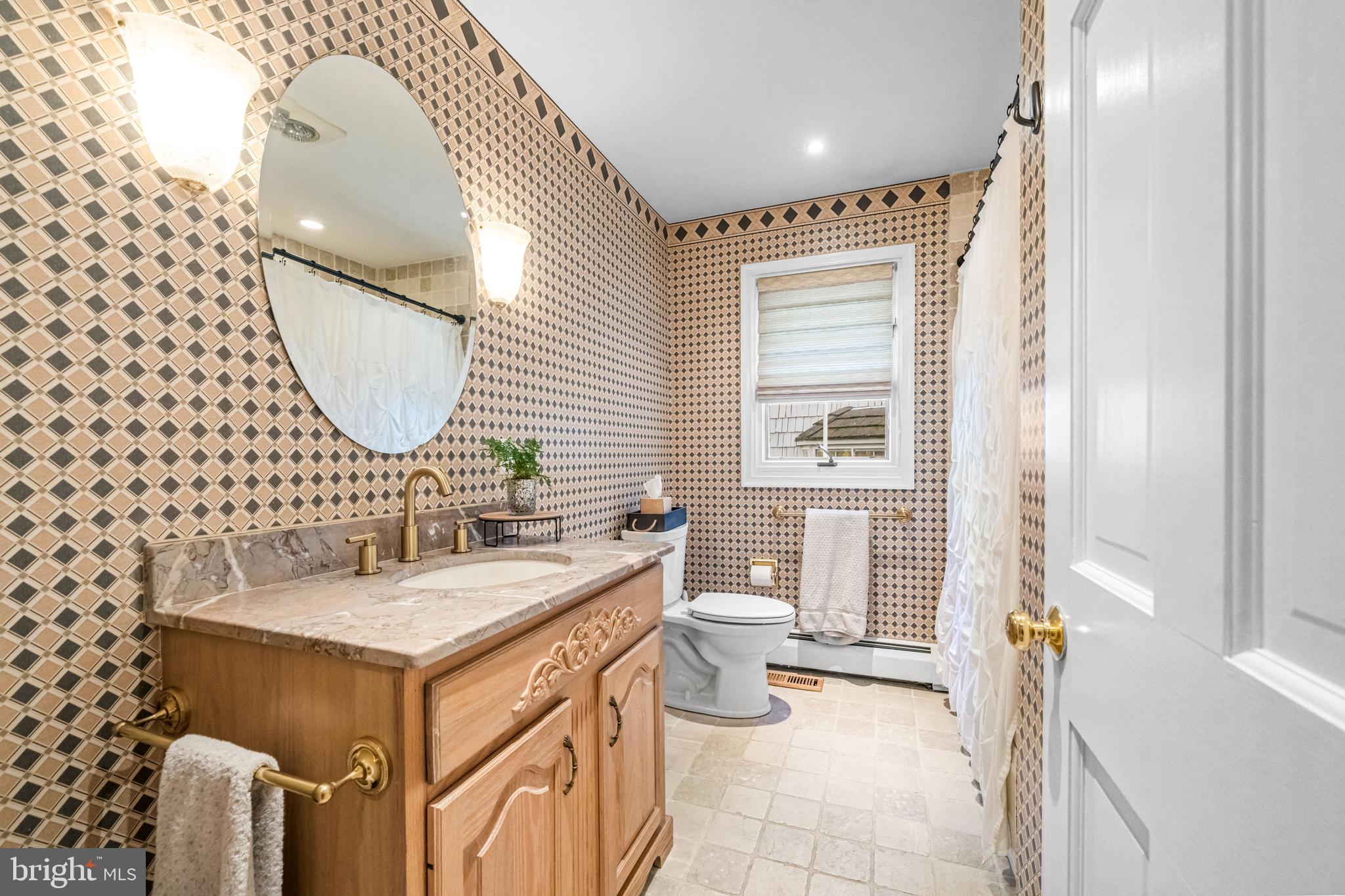 2959 Burnt House Hill Road Doylestown, PA 18902 - Photo 28 of 63 a bathroom with a sink and a mirror