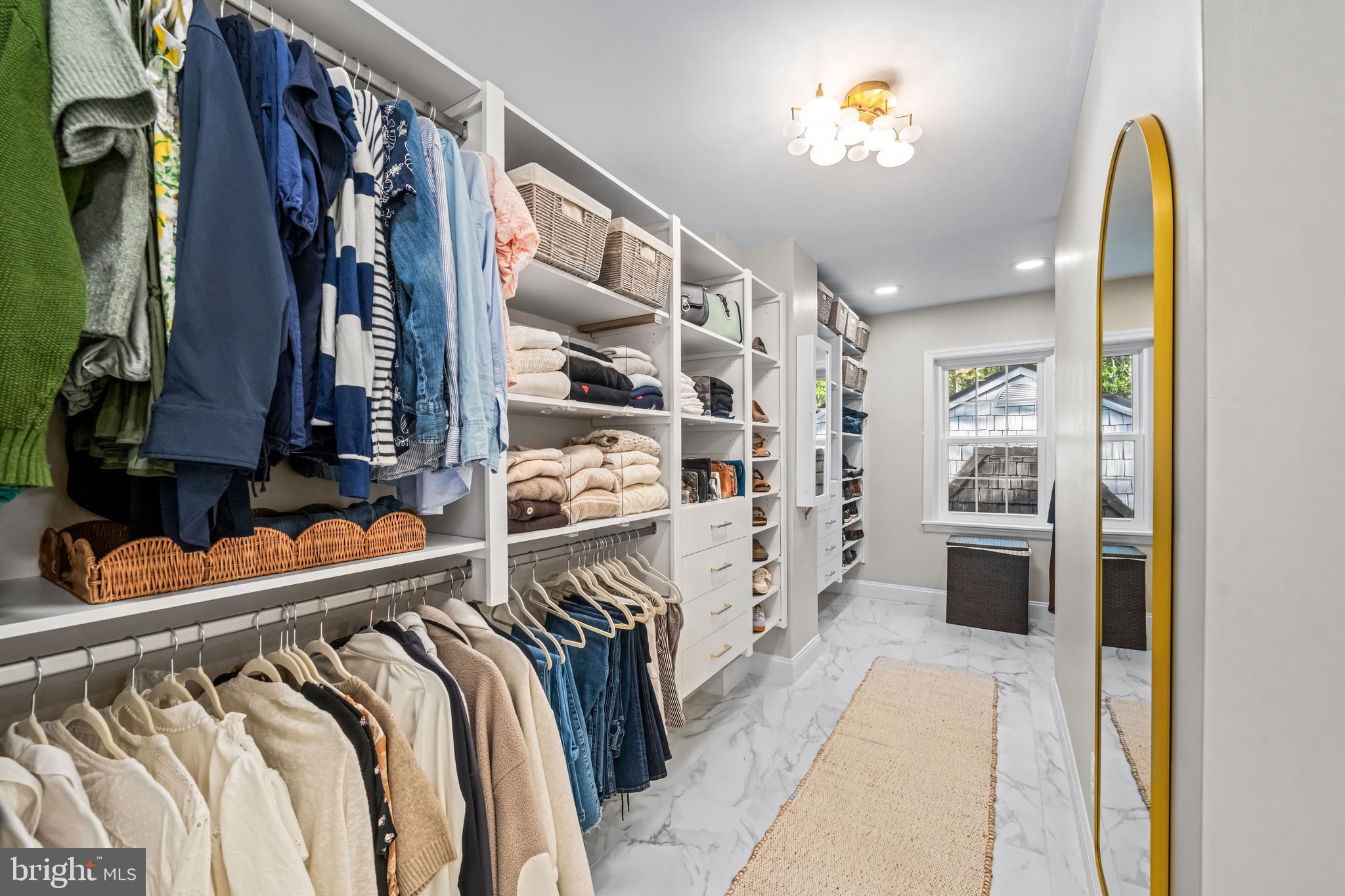 2959 Burnt House Hill Road Doylestown, PA 18902 - Photo 35 of 63 a view of walk in closet with clothes and shoes