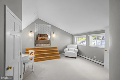a kitchen with granite countertop stainless steel appliances a refrigerator cabinets and a sink