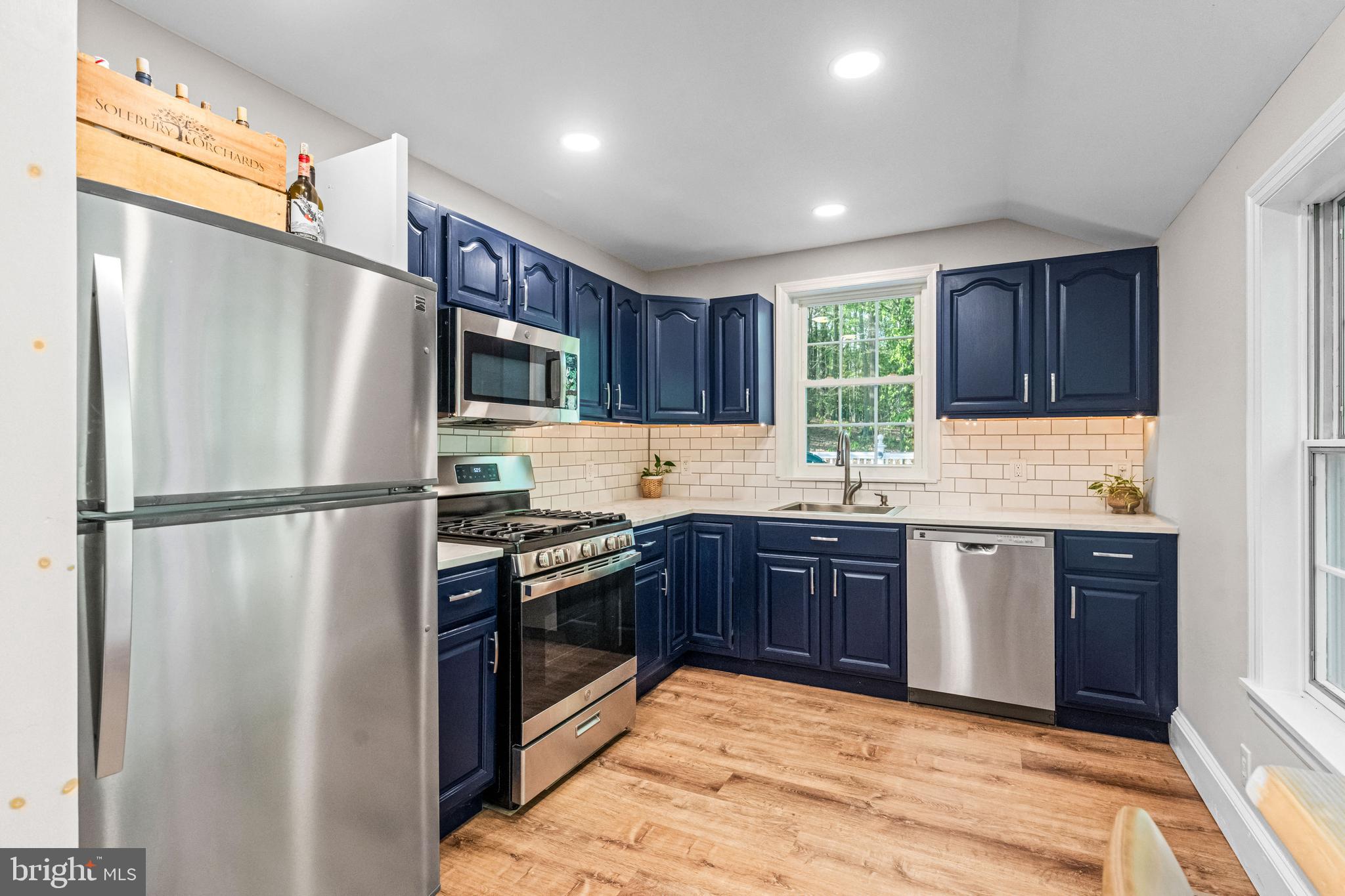 2959 Burnt House Hill Road Doylestown, PA 18902 - Photo 43 of 63 a kitchen with granite countertop stainless steel appliances a refrigerator cabinets and a sink