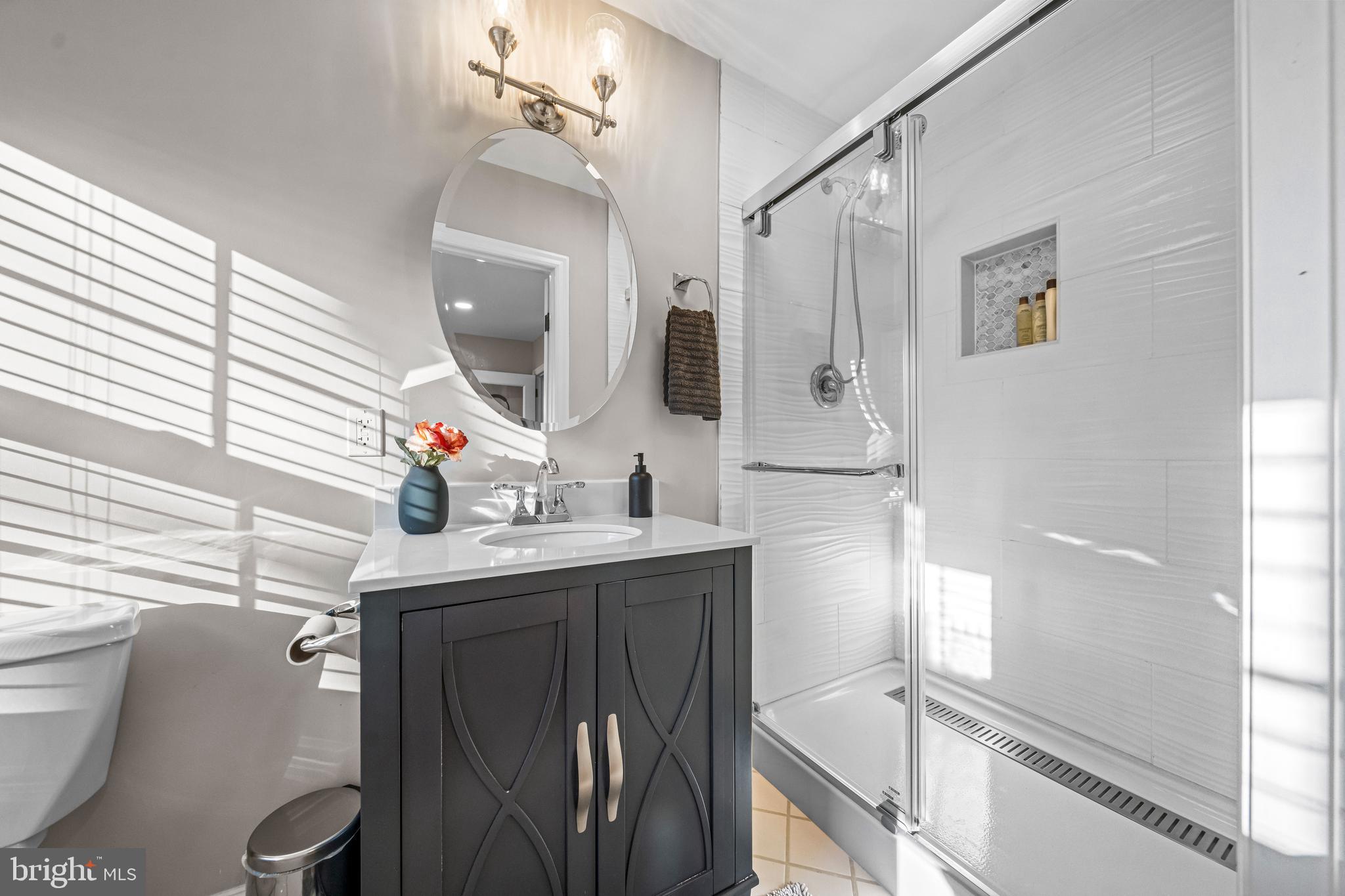 2959 Burnt House Hill Road Doylestown, PA 18902 - Photo 45 of 63 a bathroom with a sink a toilet and shower