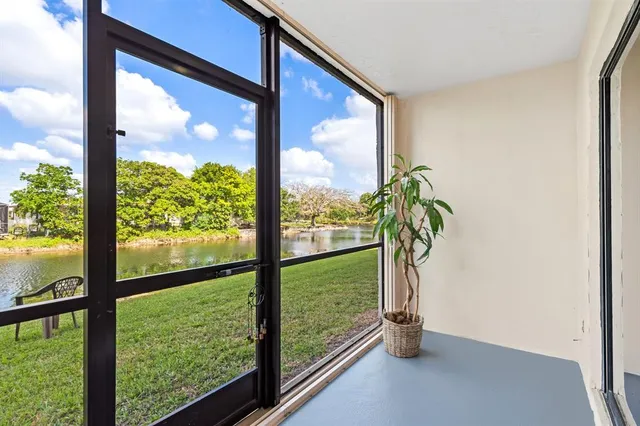 a view of a lake with a garden