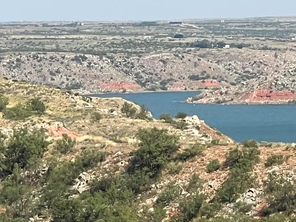 a view of an outdoor space and a lake view