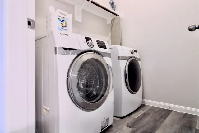 a utility room with dryer and washer