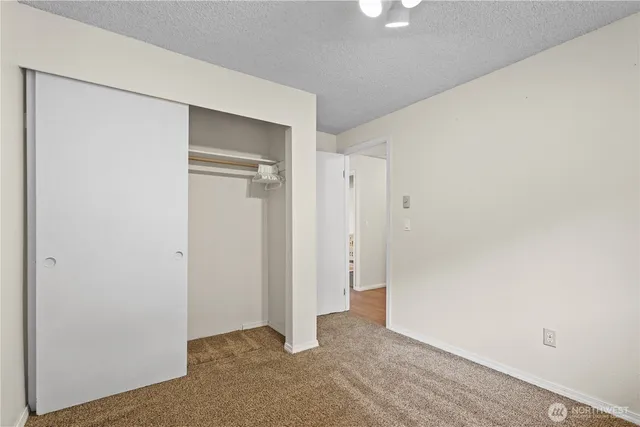 a view of a backyard with a garden