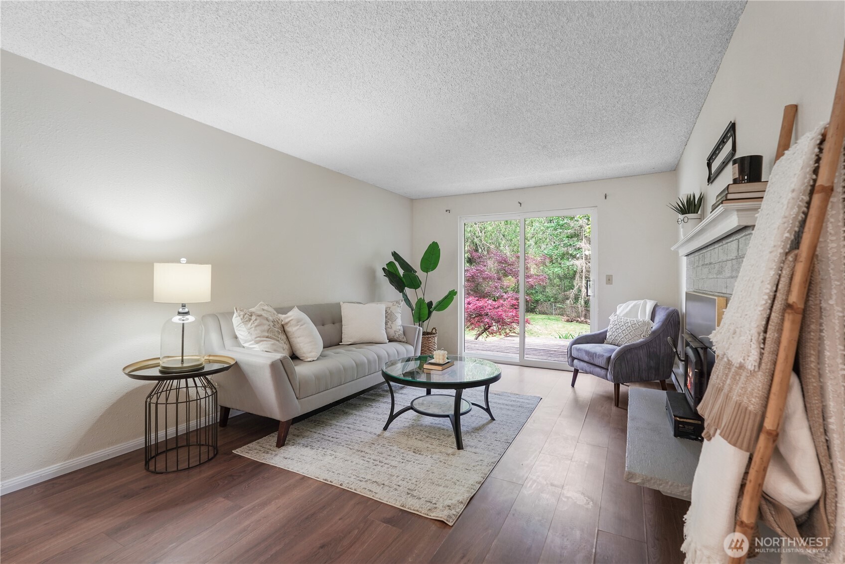 70 East Huckleberry Drive Grapeview, WA 98546 - Photo 6 of 25 a living room with furniture and a large window
