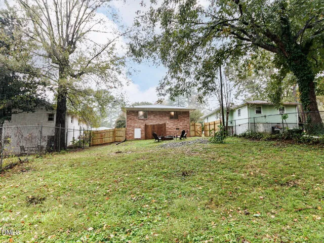 a house with trees in front of it