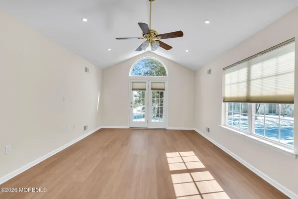 a view of an empty room with a window