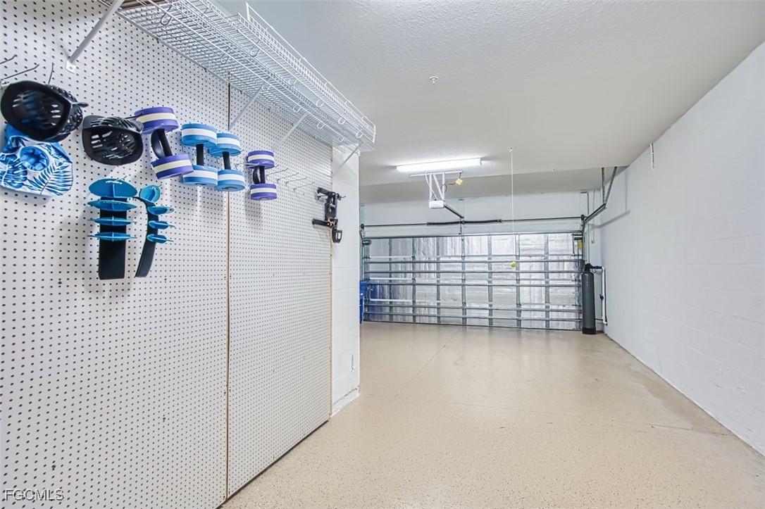 12000 Hawthorn Lake Drive, Unit 202 Fort Myers, FL 33913 - Photo 32 of 49 a view of storage and utility room