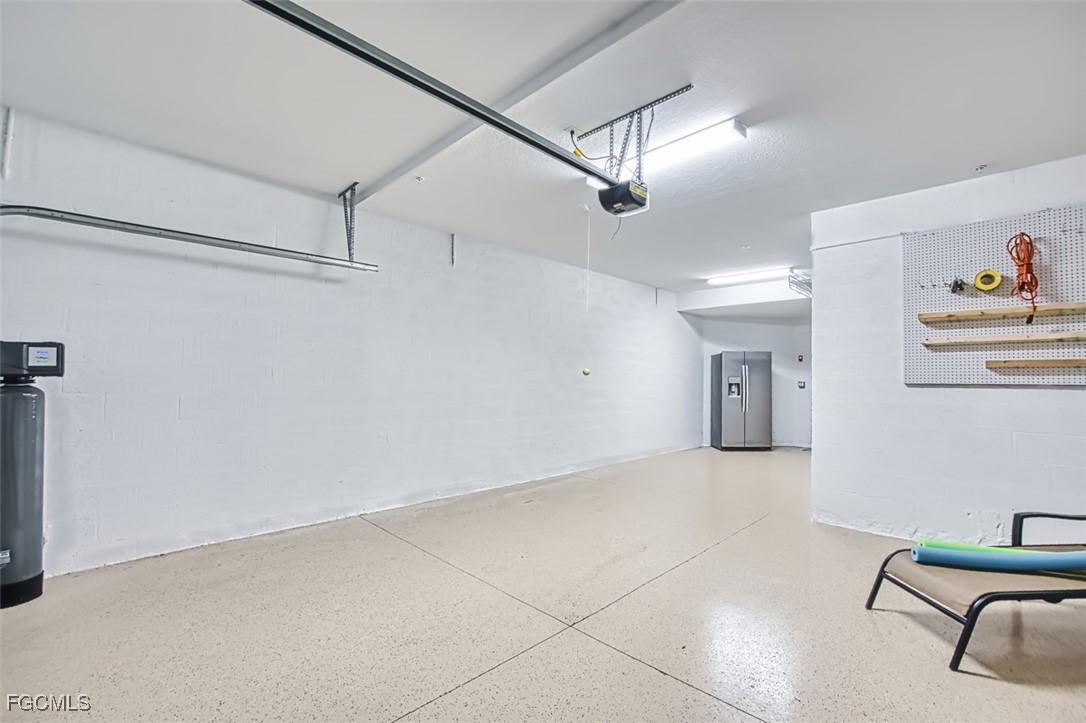 12000 Hawthorn Lake Drive, Unit 202 Fort Myers, FL 33913 - Photo 33 of 49 a view of an empty room with a window