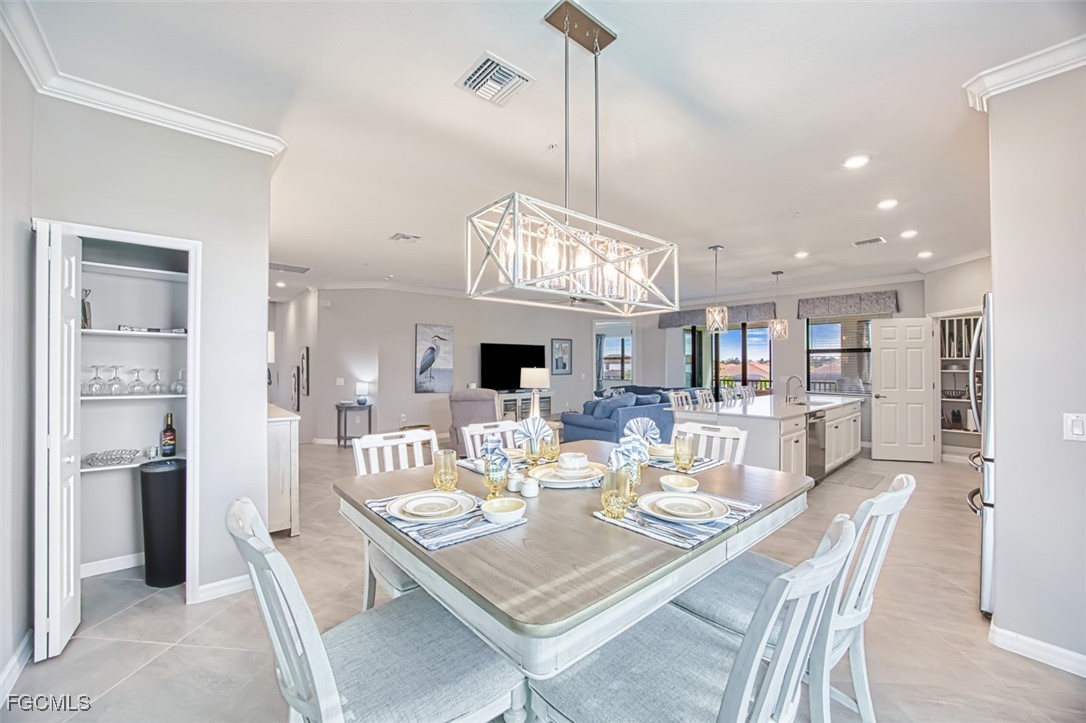 12000 Hawthorn Lake Drive, Unit 202 Fort Myers, FL 33913 - Photo 4 of 49 a view of a dining room and livingroom view