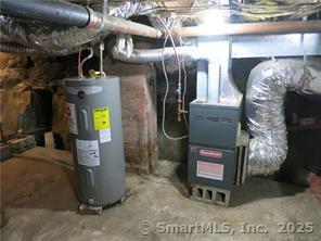 983 Riverside Drive Thompson, CT 06255 - Photo 15 of 16 a close view of water heater room