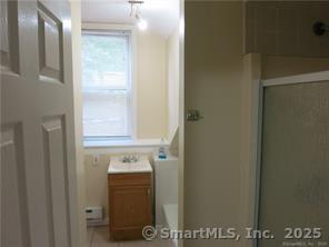 983 Riverside Drive Thompson, CT 06255 - Photo 4 of 16 a bathroom with a sink and a mirror