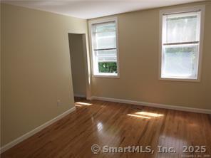 983 Riverside Drive Thompson, CT 06255 - Photo 7 of 16 a view of an empty room with window